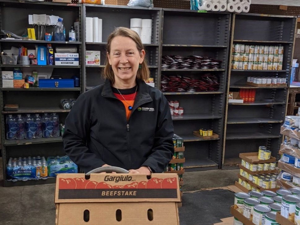 An HHCU team member supports the Community Care Center in Bedford