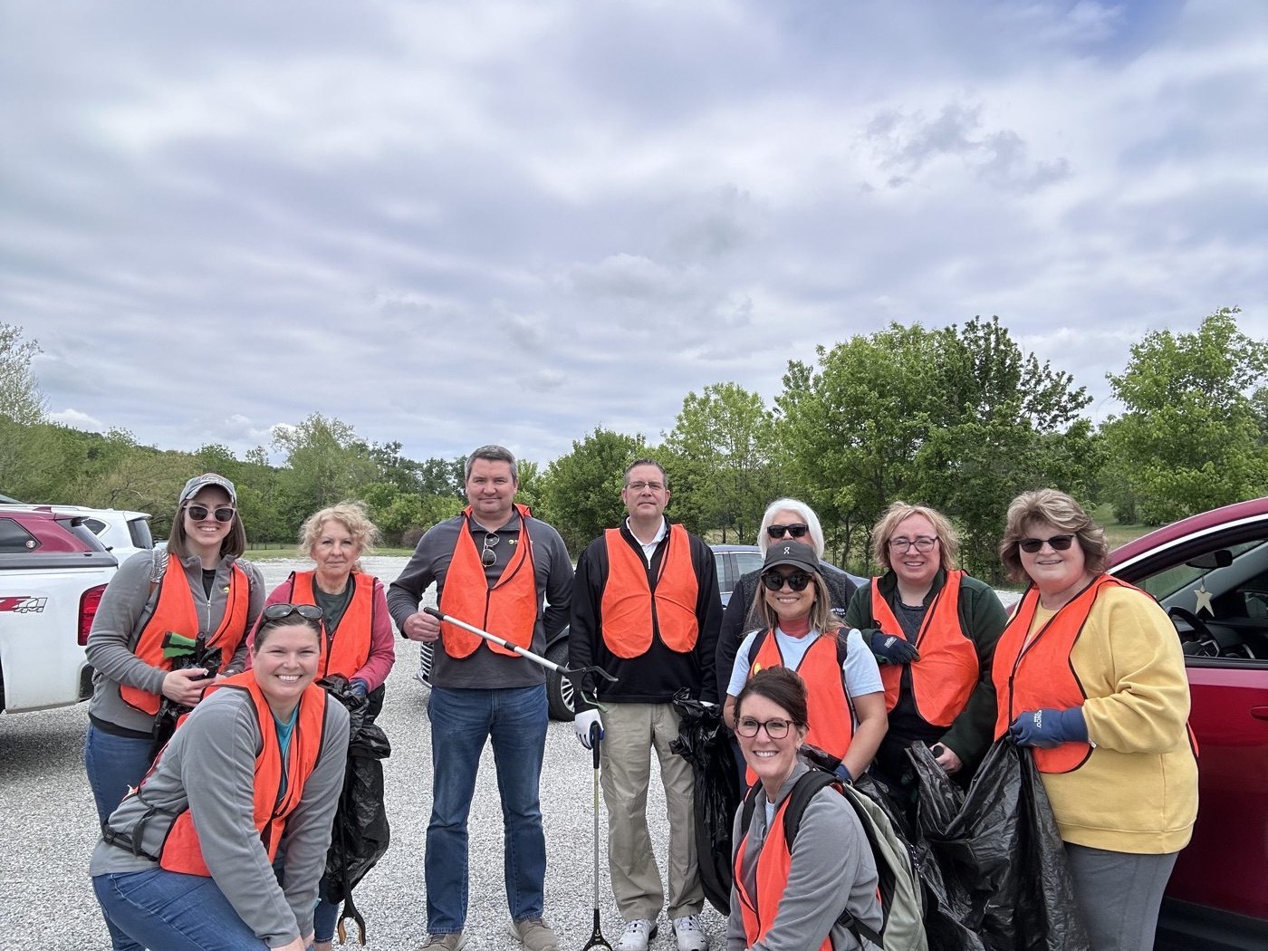 HHCU Bedford team members gather before an Adopt-a-Highway cleanup in 2026