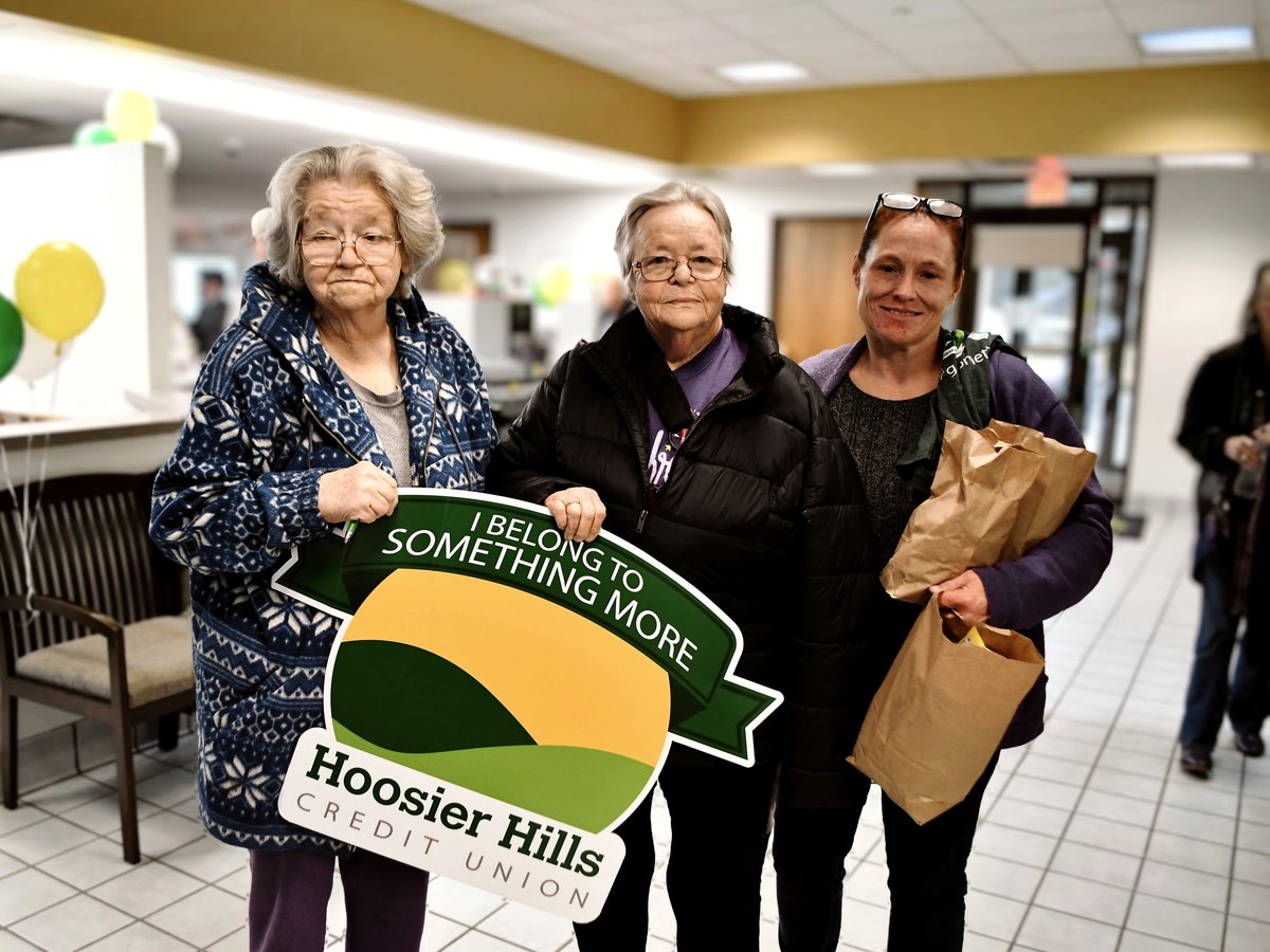 Paoli Members celebrate with an HHCU team member