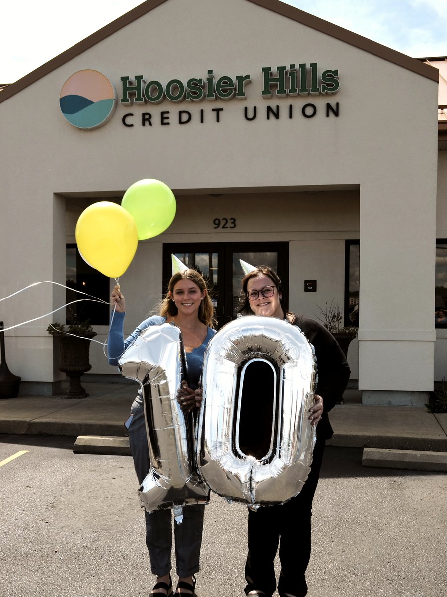 HHCU team members celebrate in front of the Tell City Service Center